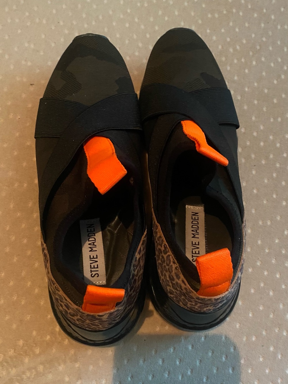 Steve Madden Kids Black Slip-On Sneakers with Orange Pull Tabs